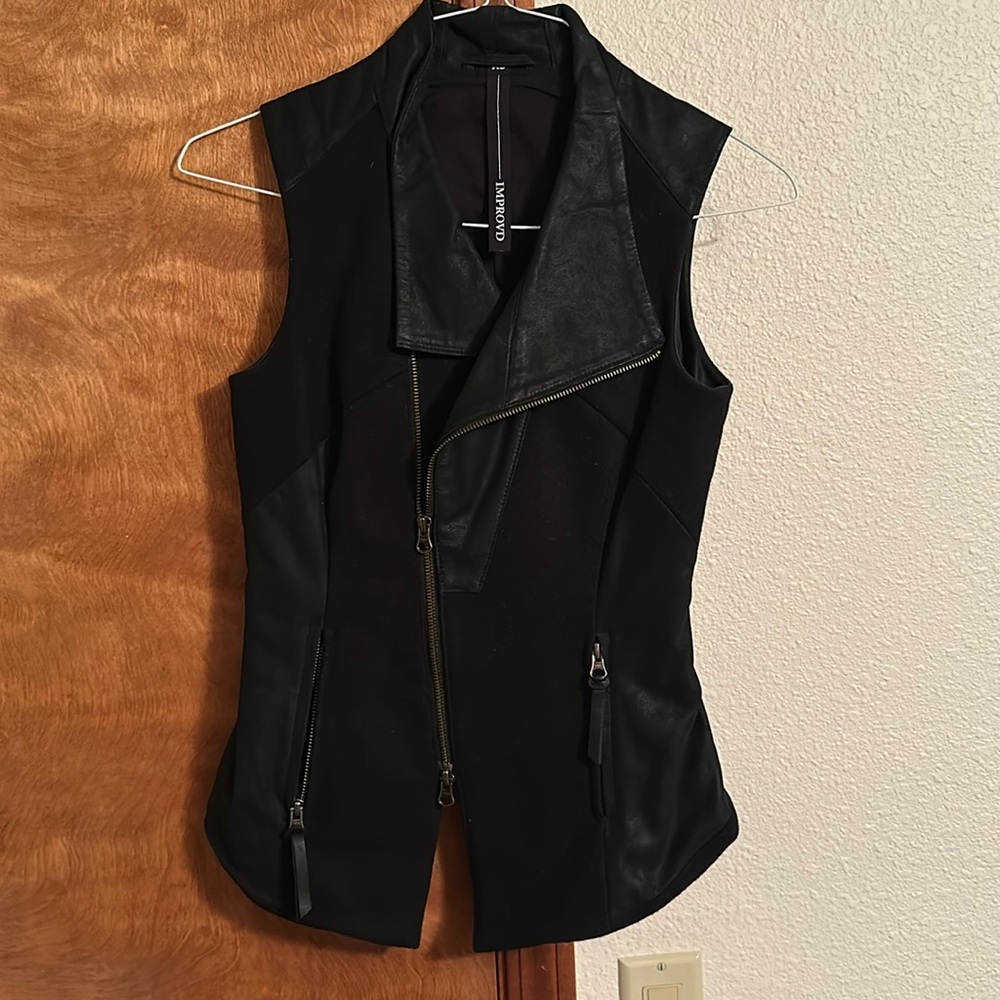 Improvd black wool and leather vest.